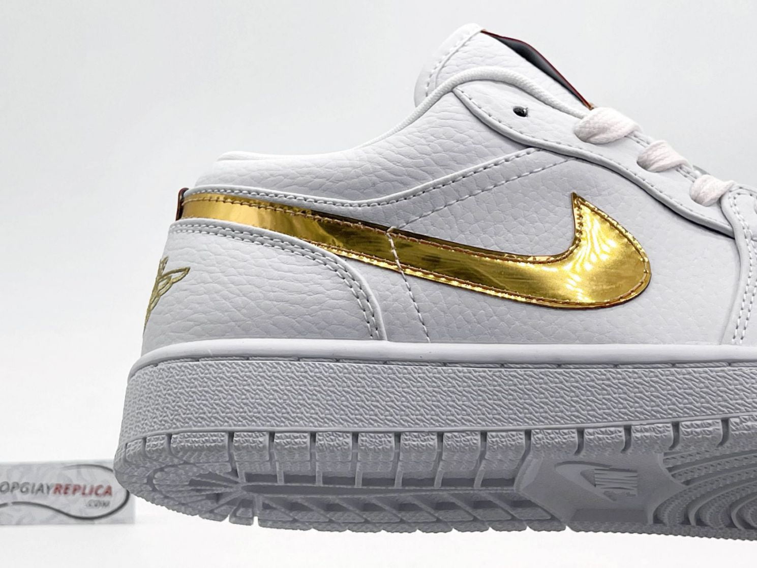 Nike Air Jordan 1 Low Metallic vàng