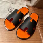 Dép Hermes Nam Da Taiga Màu Đen Đế Cam siêu cấp rep 1:1