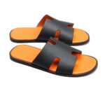 Dép Hermes Nam Da Taiga Màu Đen Đế Cam siêu cấp