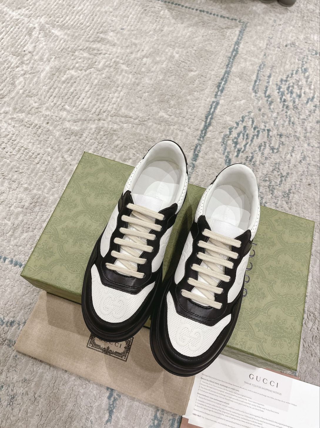 Giày Gucci GG Sneaker Black White leather họa tiết GG dập nổi Like Auth